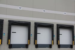 Exterior dock door signs